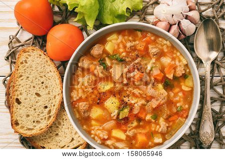 Nutrient soup with meat, rice and vegetables - mastava (uzbek kitchen).