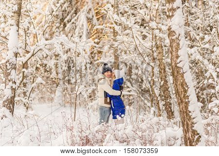 The Guy And The Girl Have A Rest In The Winter Woods.
