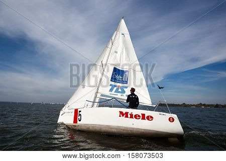 Kiev, Ukraine - September 30, 2016: Sailing yacht training day. Day before race on the Kiev reservoir or pond