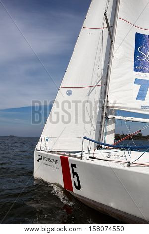 Kiev, Ukraine - September 30, 2016: Sailing yacht training day. Day before race on the Kiev reservoir or pond