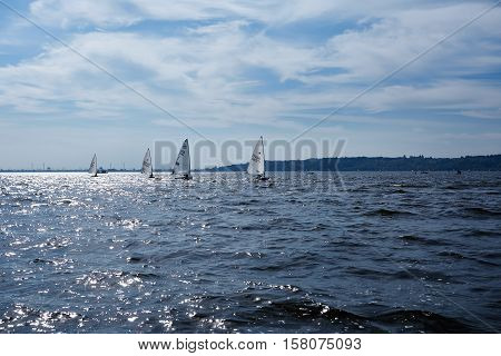Kiev, Ukraine - September 30, 2016: Sailing yacht training day. Day before race on the Kiev reservoir or pond