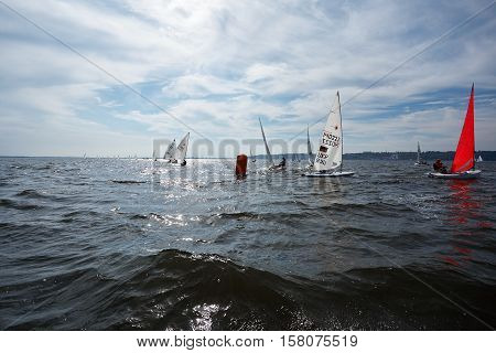 Kiev, Ukraine - September 30, 2016: Sailing yacht training day. Day before race on the Kiev reservoir or pond