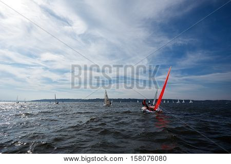 Kiev, Ukraine - September 30, 2016: Sailing yacht training day. Day before race on the Kiev reservoir or pond