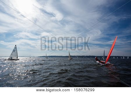 Kiev, Ukraine - September 30, 2016: Sailing yacht training day. Day before race on the Kiev reservoir or pond