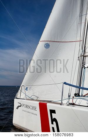 Kiev, Ukraine - September 30, 2016: Sailing yacht training day. Day before race on the Kiev reservoir or pond