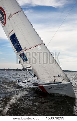 Kiev, Ukraine - September 30, 2016: Sailing yacht training day. Day before race on the Kiev reservoir or pond