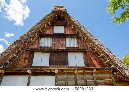 Historic Japanese village Shirakawa-go located in Gifu Prefecture. Traditional village showcasing a building style known as gassho-zukuri. one of Japan's UNESCO World Heritage Sites in summer. Wooden houses.