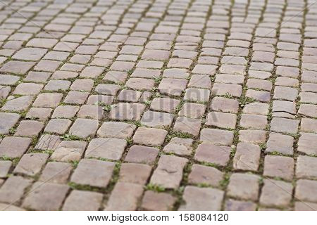 Stone road background. Red old paving photo