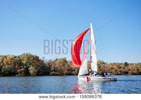 Kiev, Ukraine - September 30, 2016: Sailing yacht training day. Day before race on the Kiev reservoir or pond