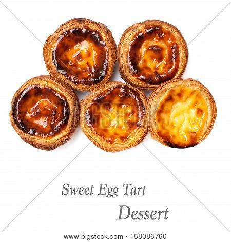 Egg Tarts isolated on white background. Heap of Typical portuguese dessert pasteis de nata close up