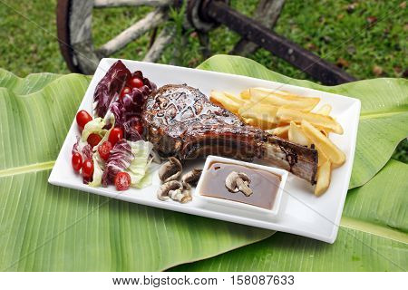 Prime rib with fries and salad