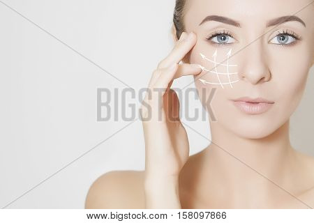 Closeup of female adult with marks on skin for cosmetic medical procedures