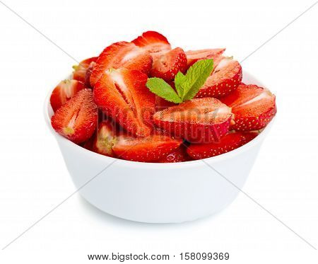 Strawberries in bawl with mint leaves isolated on white background