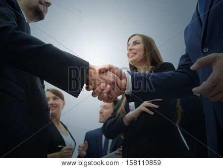 Business handshake. Business handshake and business people conce