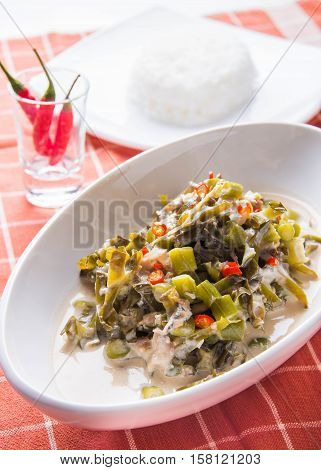 chopped legumes and winged beans in bagoong sauce