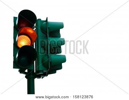 Green traffic light with burning yellow lamp supervisory road. Transport street routes management object for city crossroads. Isolated on white background