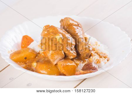 chicken with tomato sauce with carrots and potatoes also known as chicken caldereta