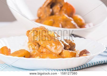 chicken with tomato sauce with carrots and potatoes also known as chicken caldereta
