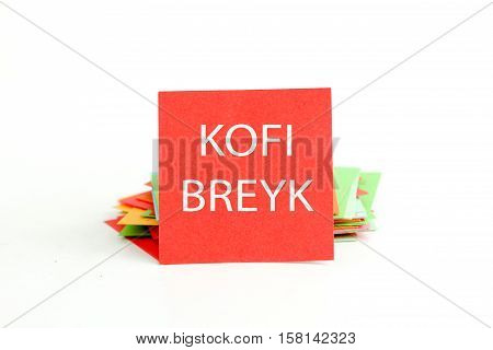 picture of a red note paper with mispelled text coffee break