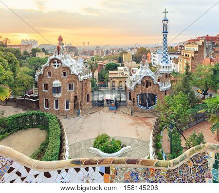 Park Guell in Barcelona. View to entrace houses with mosaics on foreground