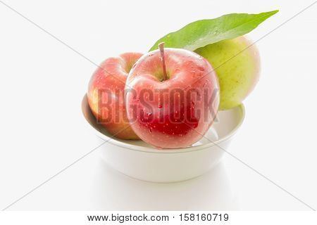 Fruits like placed on a white floor and a