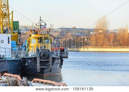 MOSCOW, RUSSIA - NOVEMBER 11, 2016: State Unitary Enterprise Mosvodostok River vessels are berthed on the Moscow River.