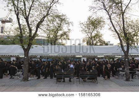 BANGKOK THAILAND - NOV 22 : stand in row of mourners in sanam luang for into Grand Palace while the funeral of king Bhumibol Adulyadej on november 22 2016