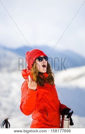 Girl Enjoys A Hygienic Lipstick In The Mountains.
