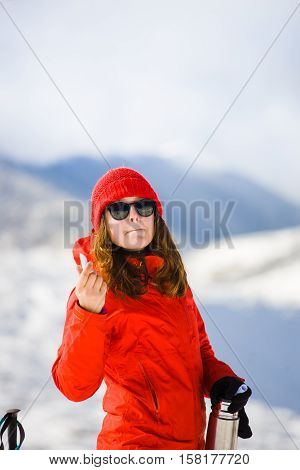 Girl Enjoys A Hygienic Lipstick In The Mountains.