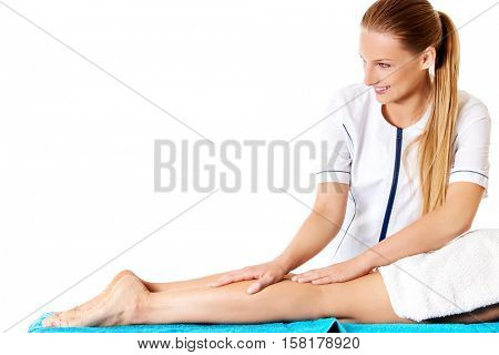 Woman having massage of body in the spa salon. Beauty treatment concept.