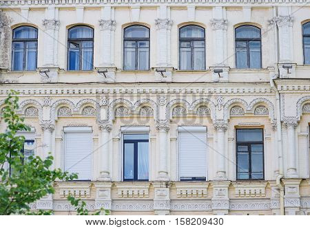 historic building with Windows and columns on facade