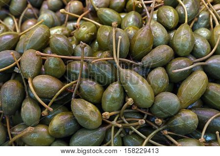 Green Pickled Big Capers Close Up Background