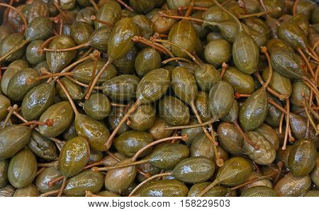 Green Pickled Big Capers Close Up Background