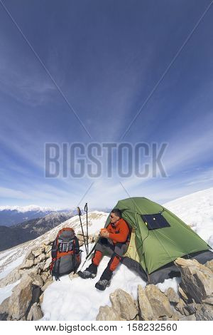 Camping on the top of the mountain in winter.