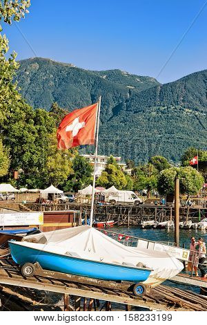Boat With Swiss Flag At Promenade In Ascona Ticino Switzerland