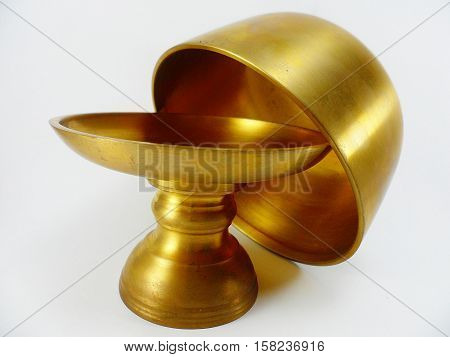 Brass bowl found out that a lot of people are pretty ridiculous with commercial rice for the monks. 
Use a Brass bowl with a brass tray showed that the rice in the bowl for higher of glorification.