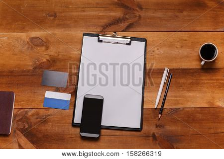Post blog social media. View from above with copy space. Background for banner template layout mockup.Brown wooden office table, top view on workplace.