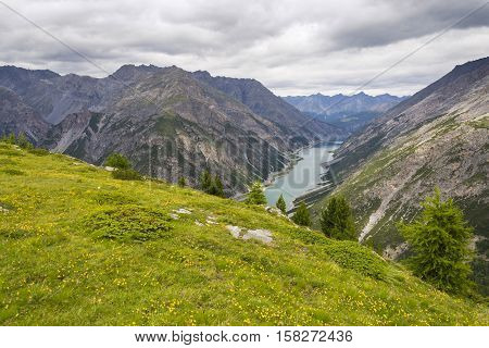 Aerial View Of Livigno Lake In Alps Mountains, Lombardy, Italy