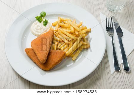 Fried cheese with french fries and tartar sauce