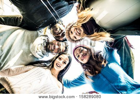 Group of friends smiling from above. Concept about youth