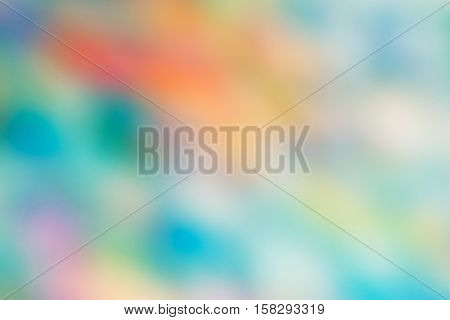 Abstract colorful blurry background warm green and red orange colors tone cinematic effect