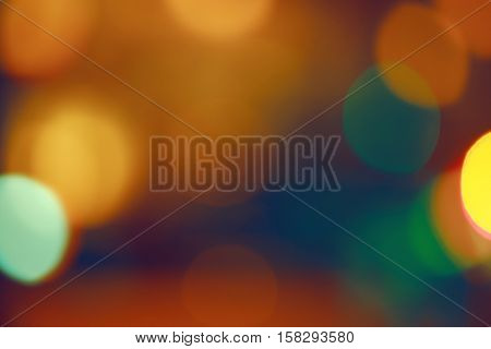 Abstract colorful blurry background cold and warm colors tone cinematic effect evening night street romantic lights