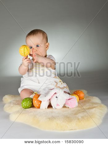 Young Cute Baby In An Easter Setting