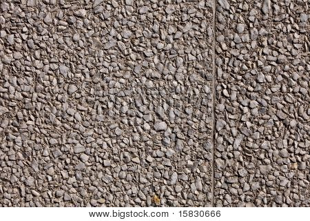 Frammento di un muro di granito frantumato