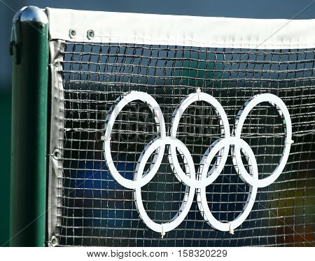 RIO DE JANEIRO, BRAZIL - AUGUST 13, 2016: Olympic rings at the main tennis venue Maria Esther Bueno Court of the Rio 2016 Olympic Games at the Olympic Tennis Centre