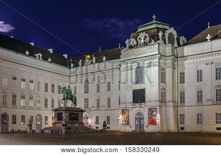 Austrian National Library old entrance at Josefsplatz with monument to Emperor Joseph II Vienna. Evening