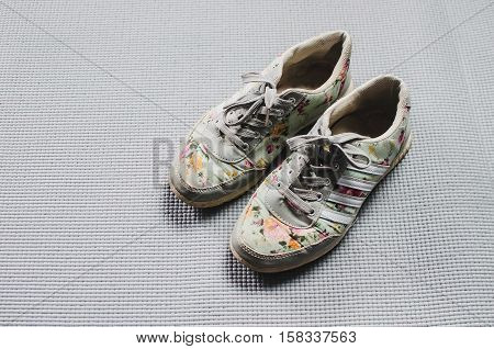 Sneakers are on grey background fitness sports classes pair easy