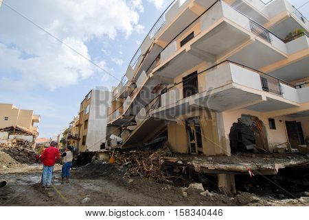 Scaletta Marina, Italy - October 3 2009. A landslide has invaded the Sicilian town causing many deaths. The collapse of a mountain caused hundreds of tons of earth and rock fell on buildings and cars.