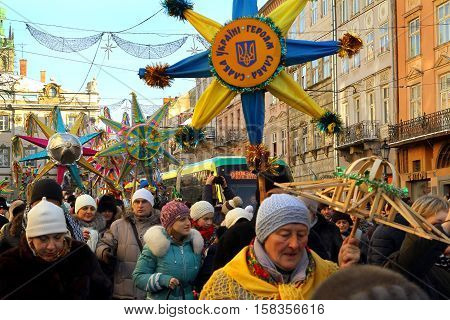 Lviv Ukraine - January 8 2016: Participants of the mass holiday festivities are going in the center of the city during the celebration of Orthodox Christmas.