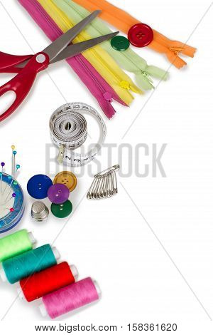Sewing tools - scissors, buttons, sewing pins, sewing needle, safety pins, thread and fabric